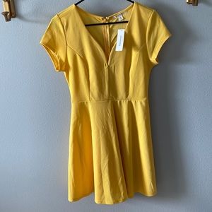 Yellow dress with tags